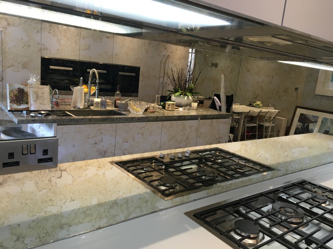 Mirror glass splashback in East Ham luxury kitchen